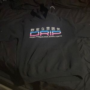 black hoodie with blue and purple graphics